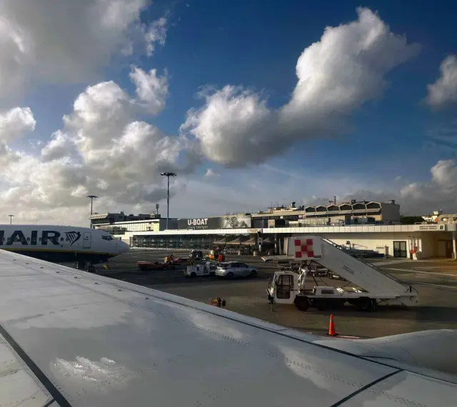 Pisa International Airport, the closest airport to Cinque Terre, with a Ryanair plane on the tarmac.
